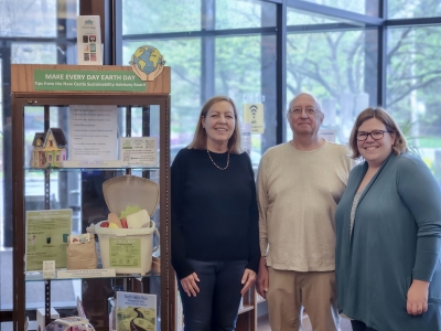 Members of the Sustainability Advisory Board pictured next to the Earth day display