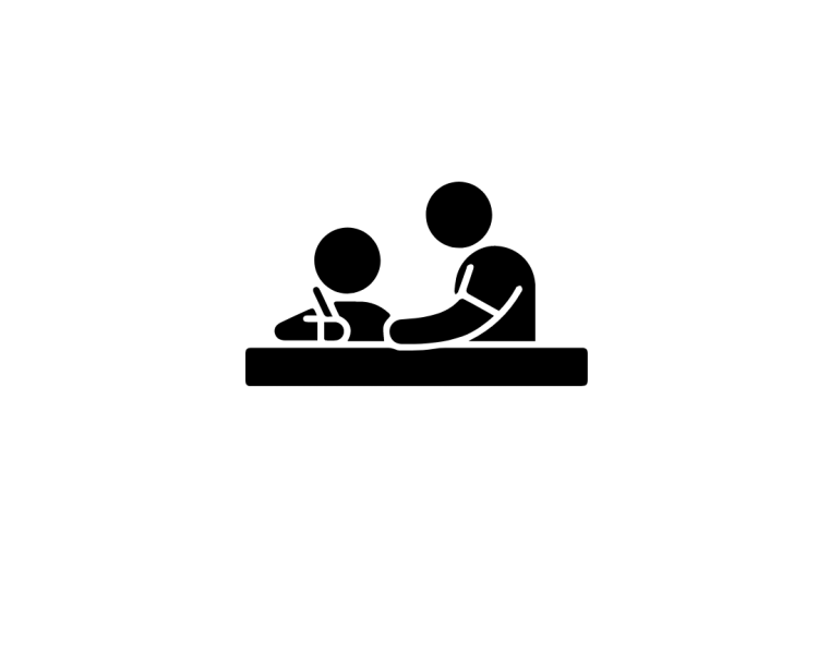 Adult helping child at table